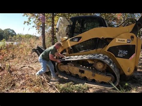 putting track back on skid steer|skid steer track came off.